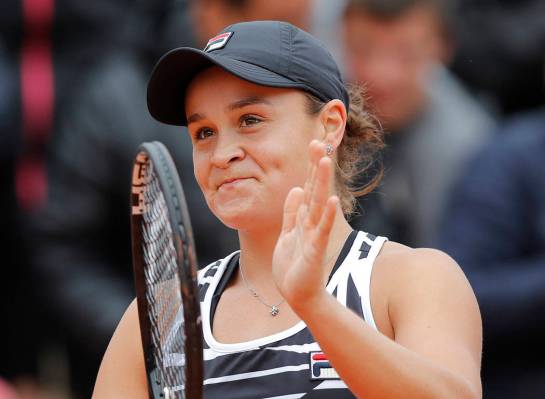 Australia's Ashleigh Barty celebrates winning her semifinal match of the French Open tennis tou ...