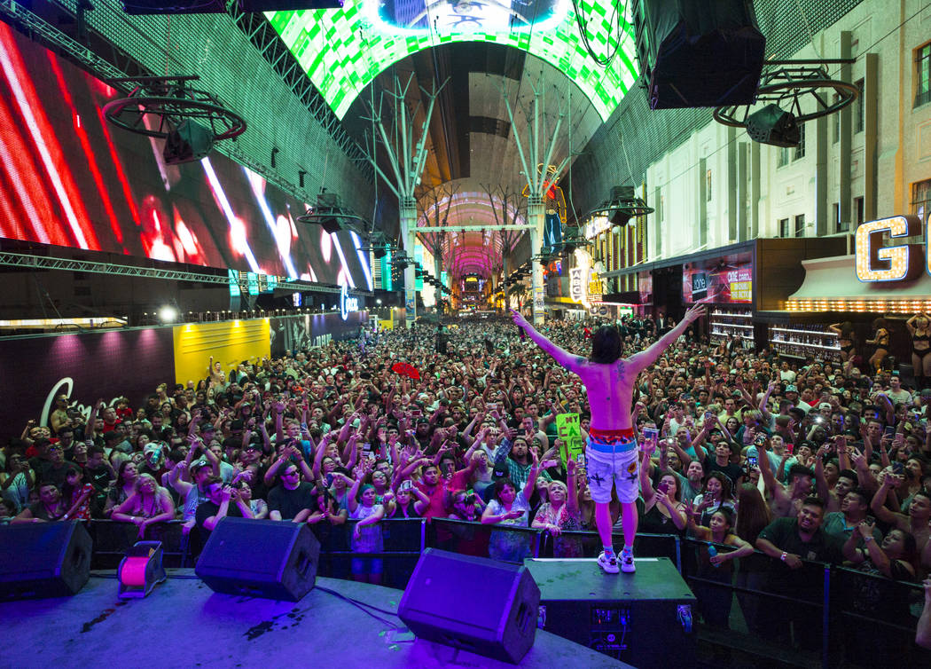 Steve Aoki performs on the Main Street Stage at the Fremont Street Experience after the debut o ...