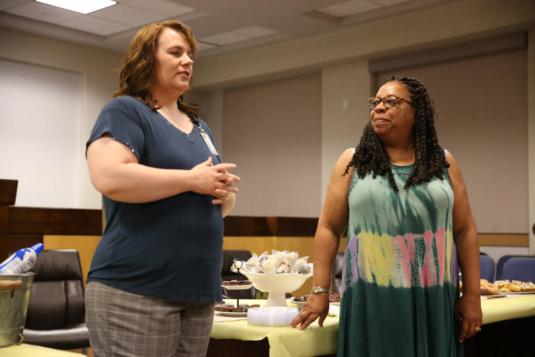 Truancy Diversion Program's Family Advocate Michelle Cutler, left, recognizes Judge Debra Harpe ...