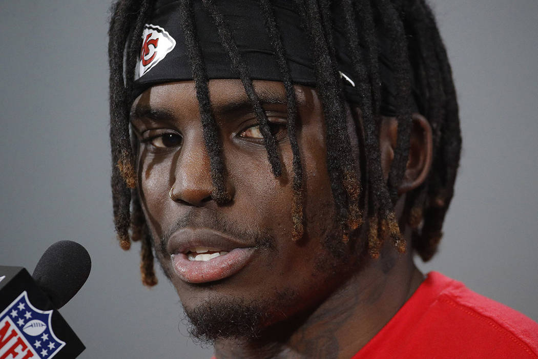 In this Jan. 18, 2019, file photo, Kansas City Chiefs wide receiver Tyreek Hill talks to the me ...