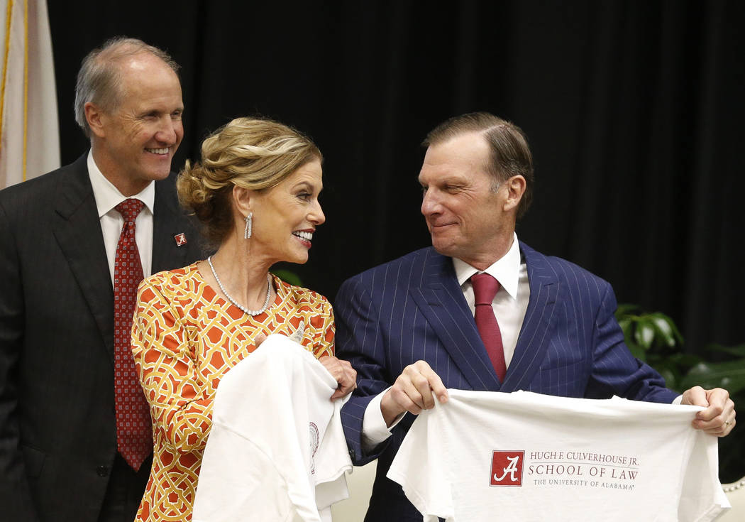 In this Sept. 20, 2018, photo, Hugh F. Culverhouse Jr., right, and wife, Eliza, in Tuscaloosa, ...