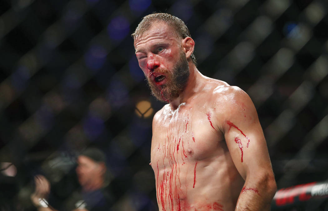 Donald Cerrone, his right eye swollen shut, is unable to fight Tony Ferguson during their light ...