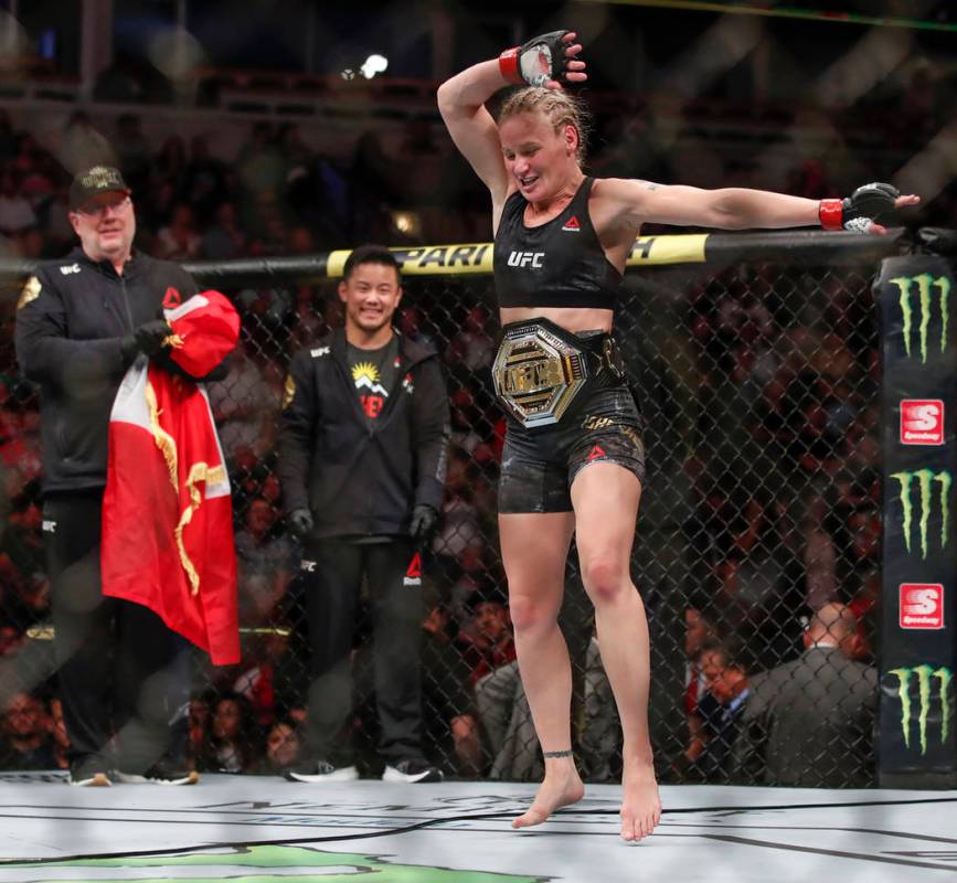 Valentina Shevchenko celebrates after defeating Jessica Eye during their women's flyweight titl ...