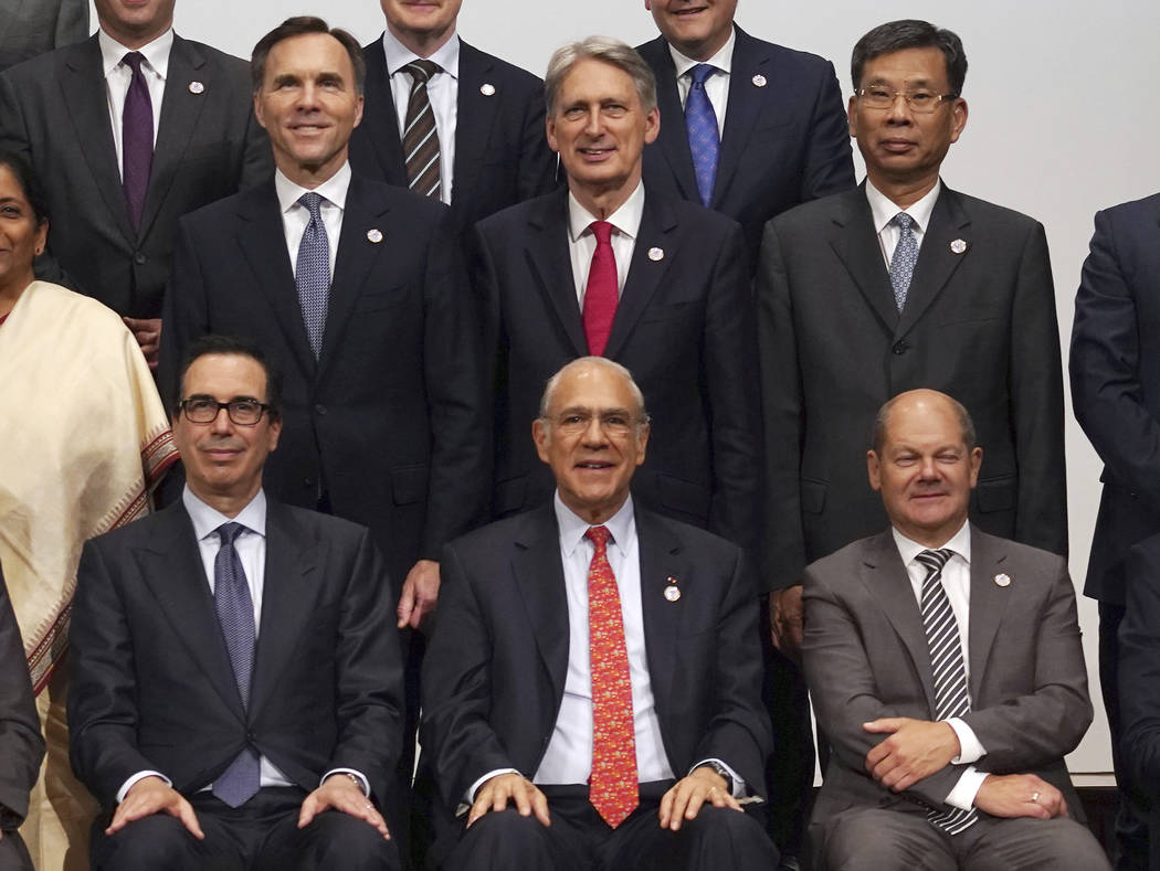 U.S. Treasury Secretary Steven Mnuchin, left bottom, and China's Finance Minister Liu Kun, righ ...