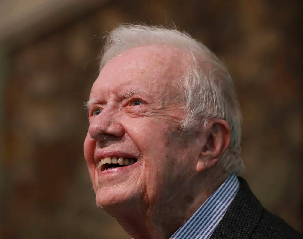 Former President Jimmy Carter smiles as he returns to Maranatha Baptist Church to teach Sunday ...