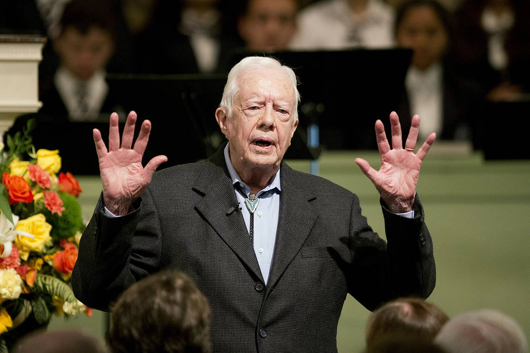 FILE - In this Sunday, Aug. 23, 2015 file photo, former President Jimmy Carter teaches Sunday S ...