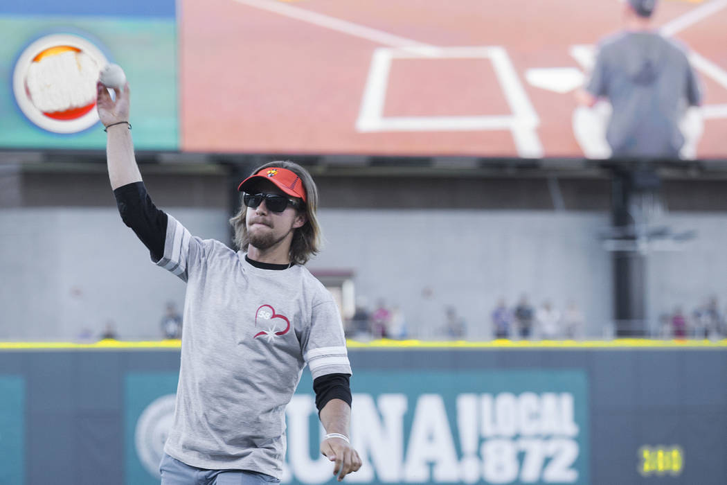 Kaden Manczuk throws out the first pitch before the start of the Las Vegas Aviators Triple A ba ...