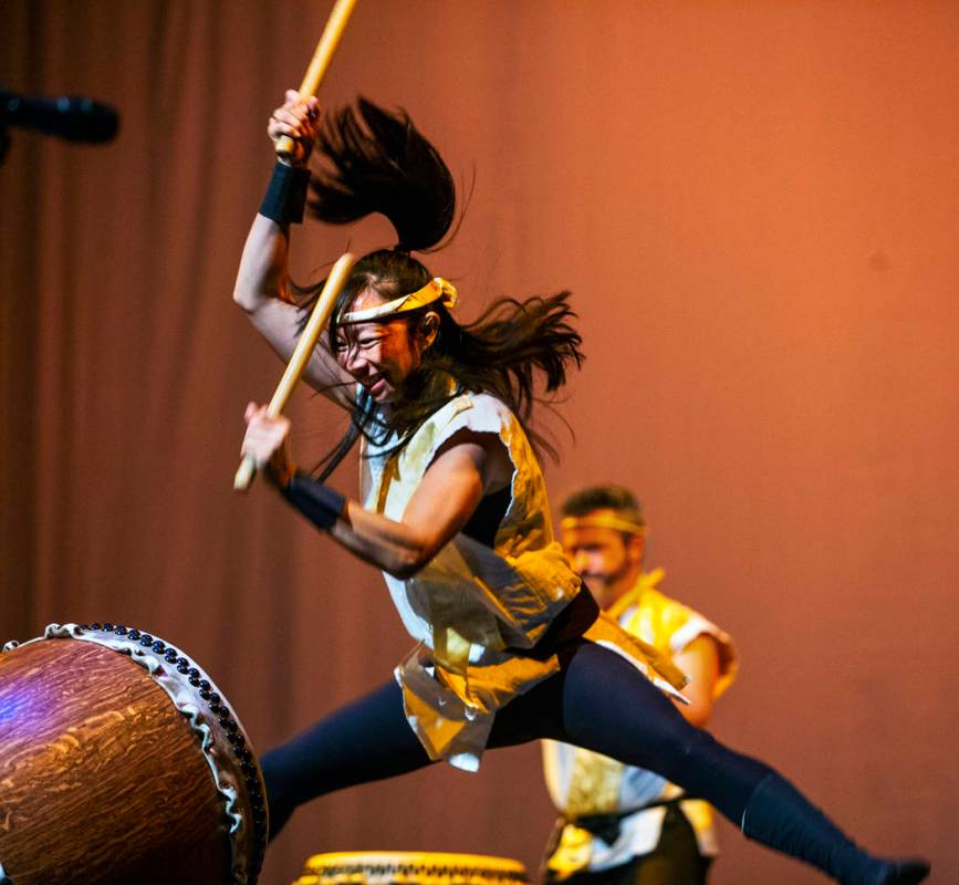 Jen Kong with Korabo jumps while performing the traditional Japanese art form of taiko for a pa ...