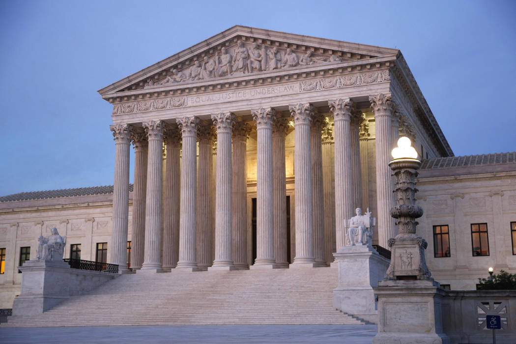 In a May 23, 2019, photo, the U.S. Supreme Court building at dusk on Capitol Hill in Washington ...