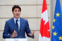 Canadian Prime Minister Justin Trudeau speaks during a joint press conference with French Presi ...