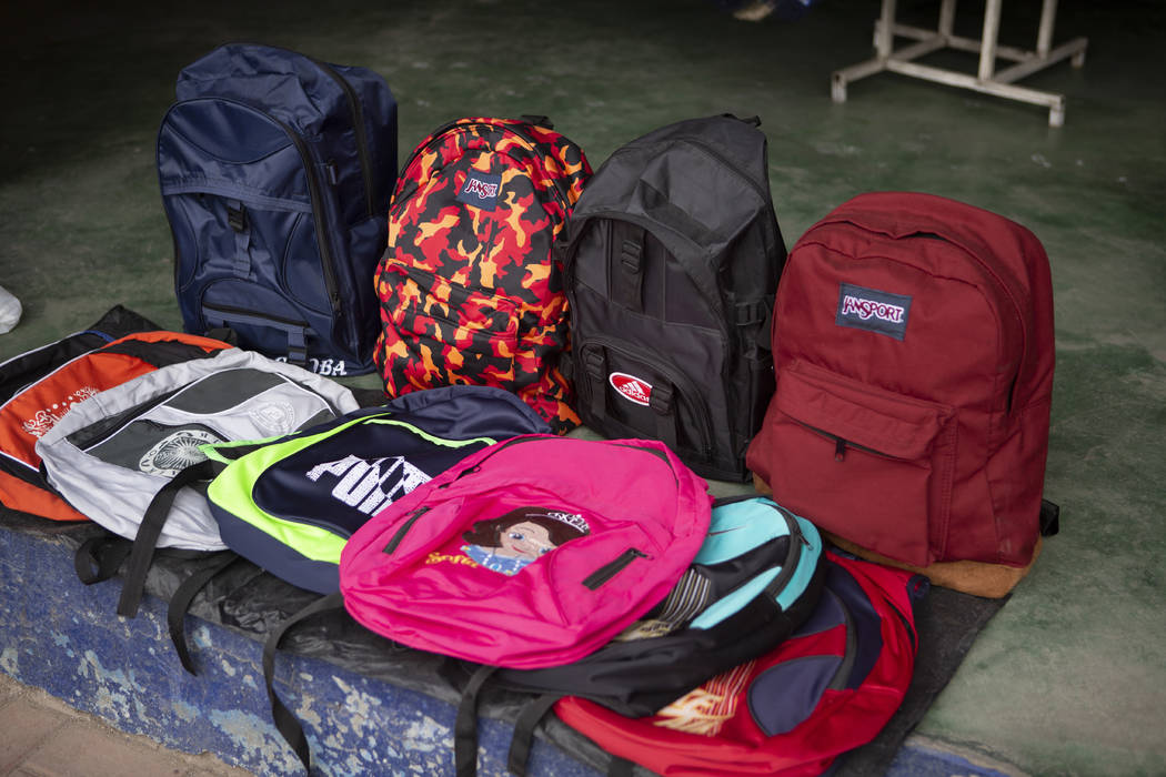 In this June 8, 2019, photo, backpacks lie for sale inside a store at the bus terminal in San M ...