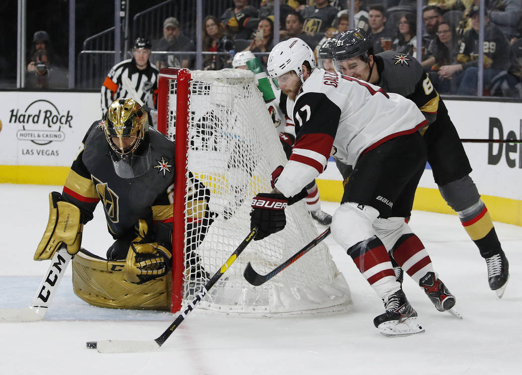 Arizona Coyotes center Alex Galchenyuk (17) attempts a wraparound shot against Vegas Golden Kni ...