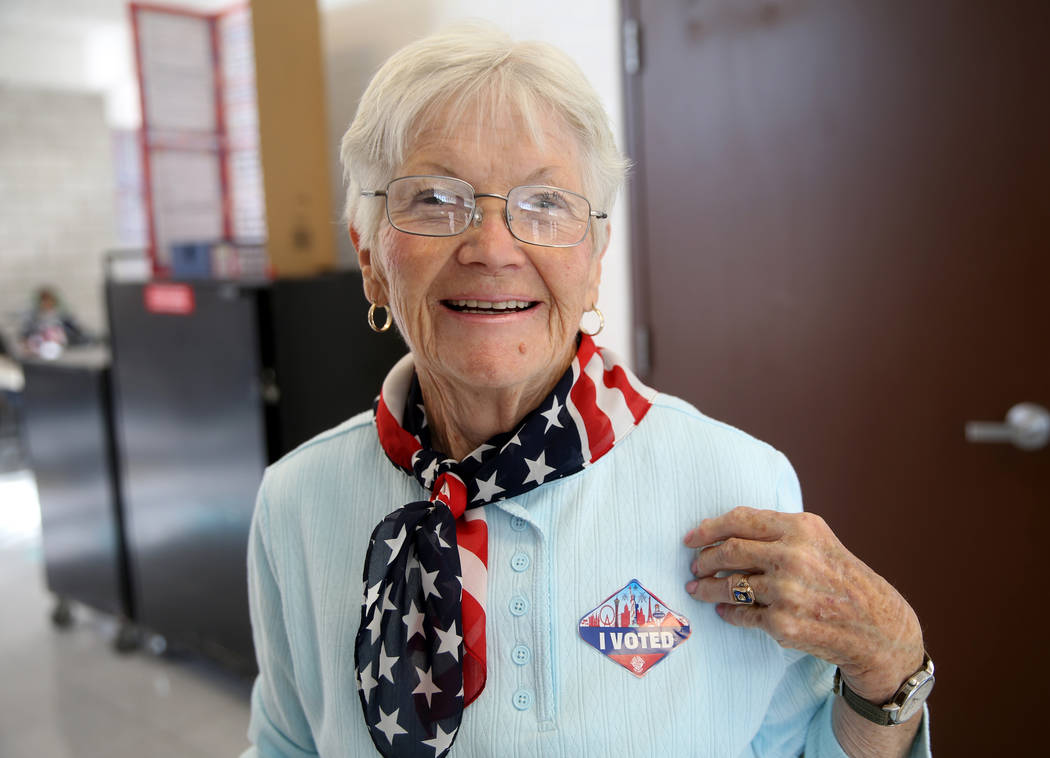 Janice Jacobsen of Las Vegas dons her "I VOTED" sticker after voting in the municipal election ...