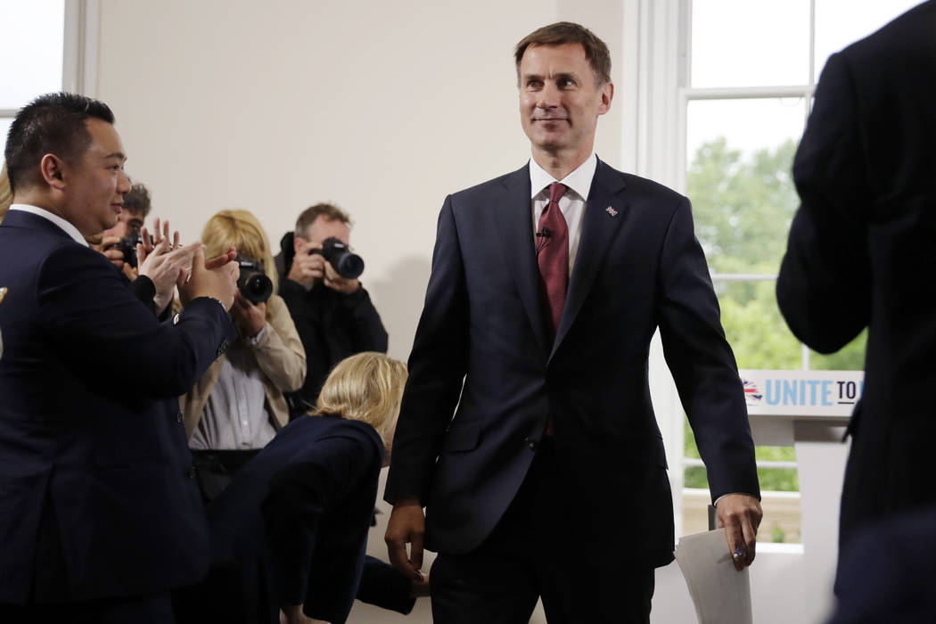 Britain's Foreign Secretary Jeremy Hunt leaves after launching his leadership campaign for the ...