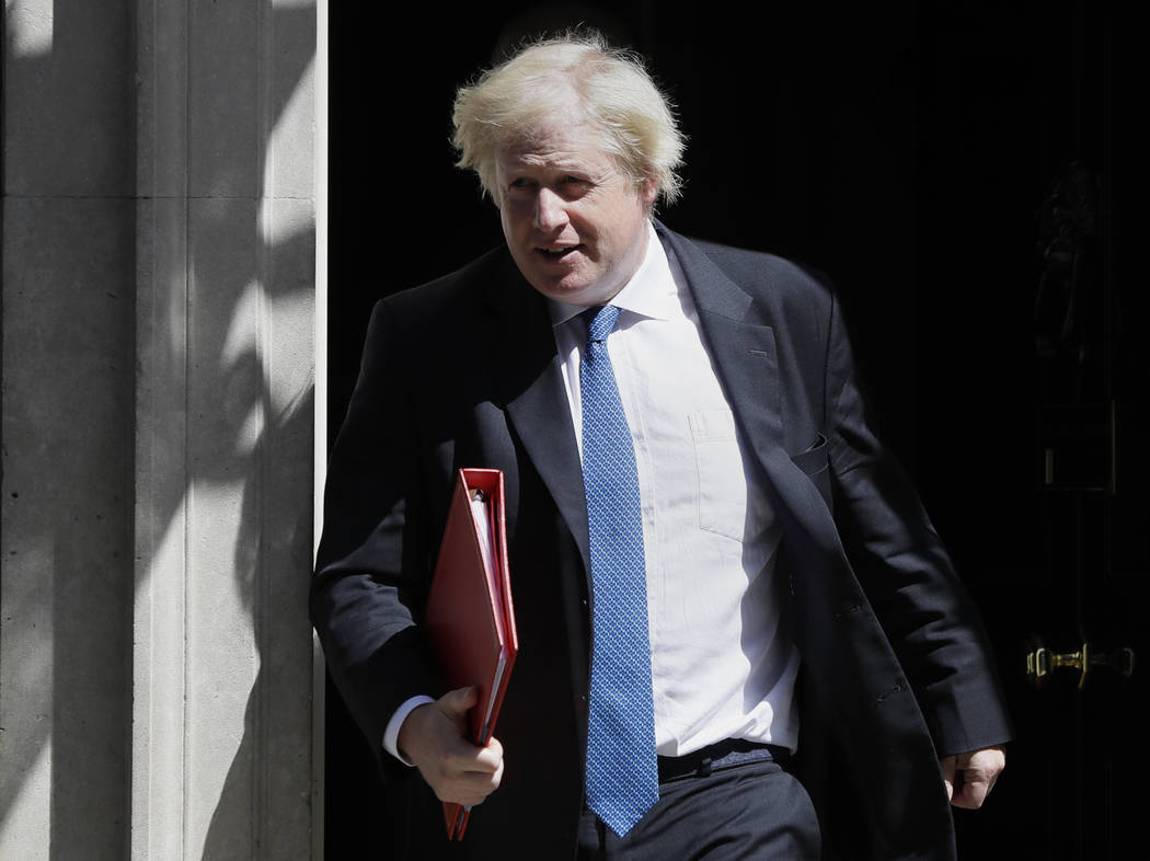 FILE - In this Wednesday, June 13, 2018 file photo, Britain's Foreign Minister Boris Johnson le ...