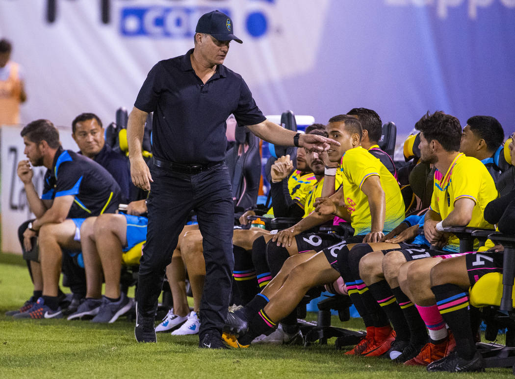 Las Vegas Lights FC head coach Eric Wynalda has a few words for a player on the bench during th ...