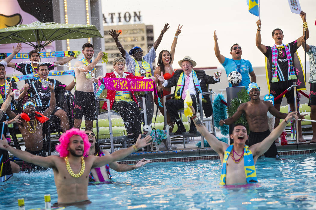 Players and special guests pose for the Lights FC team photo shoot at the Plaza in Las Vegas on ...