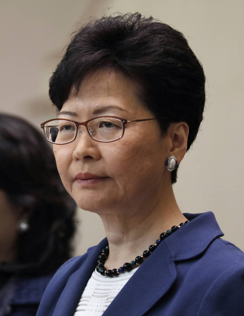 Hong Kong Chief Executive Carrie Lam listens to reporters questions during a press conference i ...