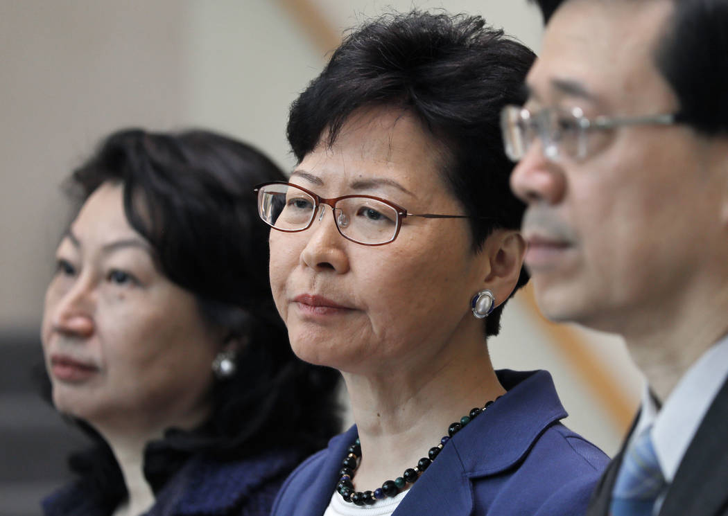 From right, Hong Kong Secretary for Security John Lee, Hong Kong Chief Executive Carrie Lam and ...