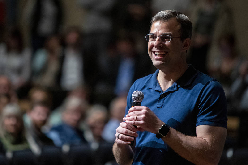 U.S. Rep. Justin Amash, R-Cascade Township, holds a town hall meeting at Grand Rapids Christian ...