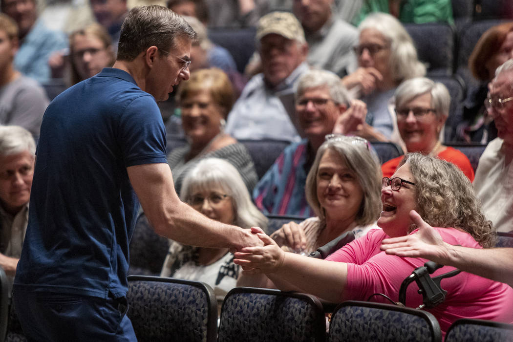 U.S. Rep. Justin Amash, R-Cascade Township, greets the crowd before holding a town hall meeting ...