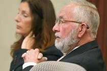 William Strampel, center, the ex-dean of MSU's College of Osteopathic Medicine and former boss ...