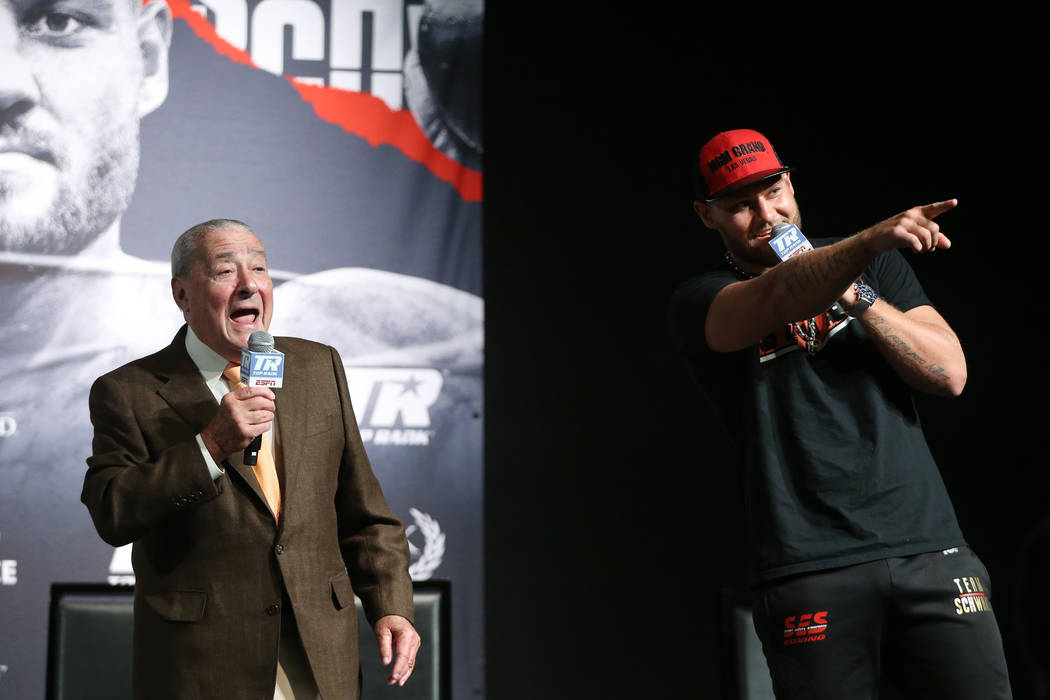 Boxing promoter Bob Arum, left, and boxer Tom Schwarz during a press conference for his upcomin ...