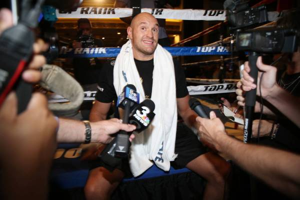 Tyson Fury is interviewed following an open workout event at the MGM Grand hotel-casino in Las ...
