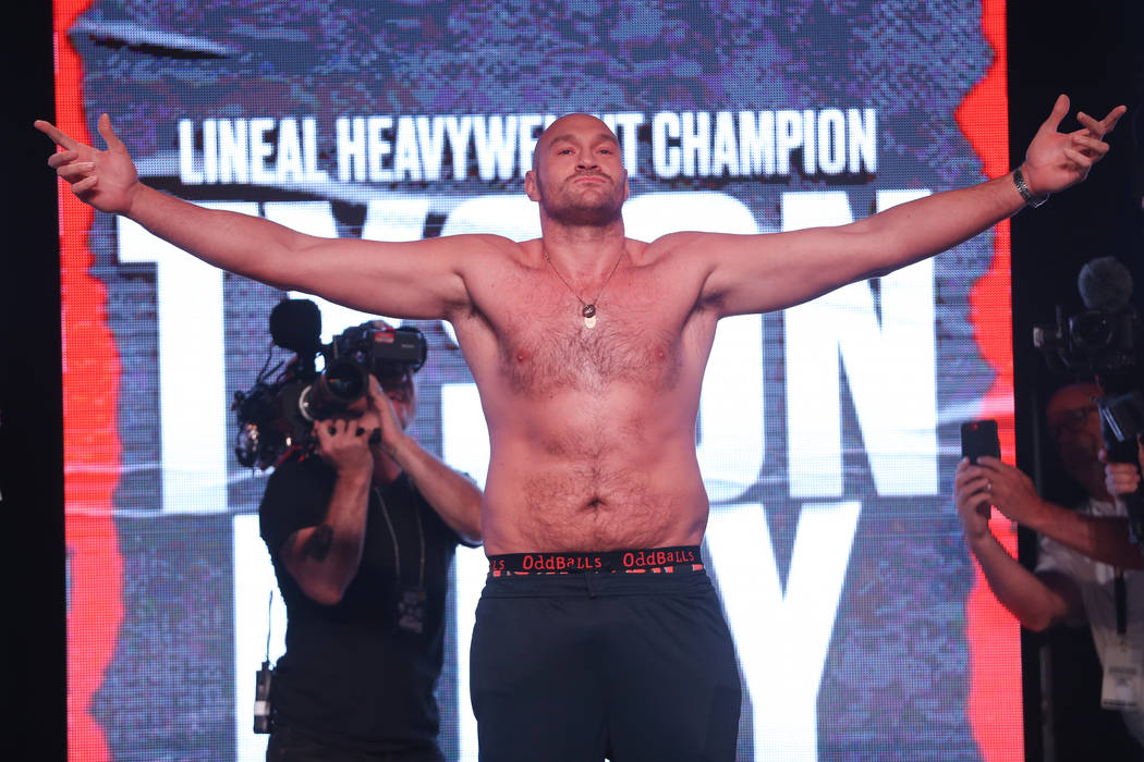 Tyson Fury poses during his weigh-in event at the MGM Grand Garden Arena in Las Vegas, Friday, ...