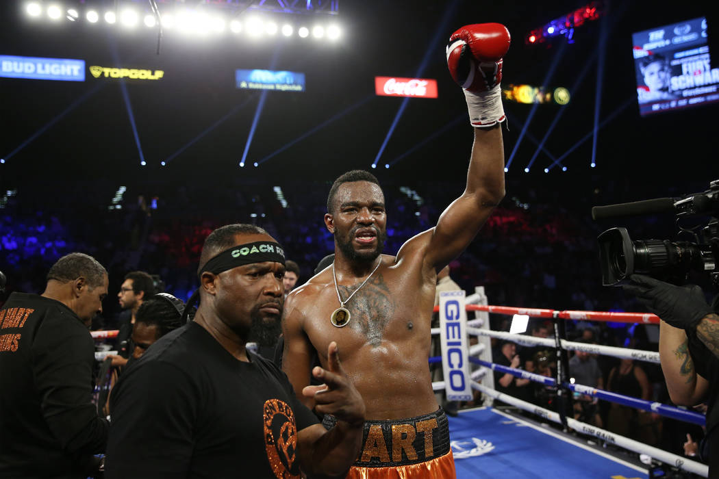 Jesse Hart celebrates his win by unanimous decision against Sullivan Barrera in the light heavy ...