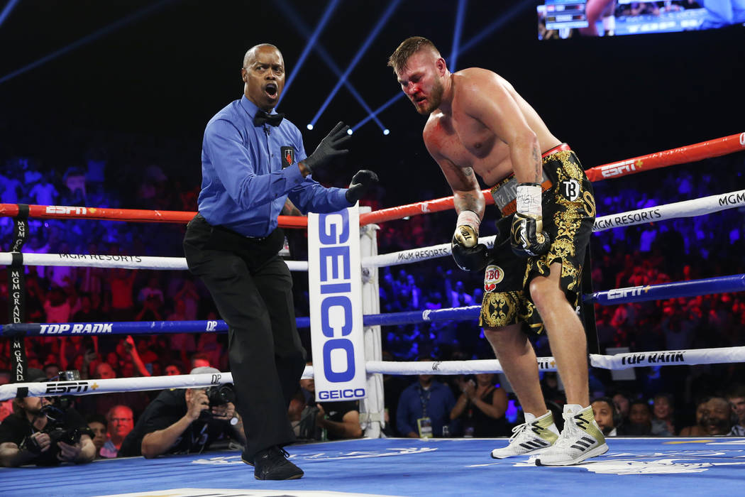 Tom Schwarz, right, gets a count after getting knocked down by Tyson Fury in the second round o ...