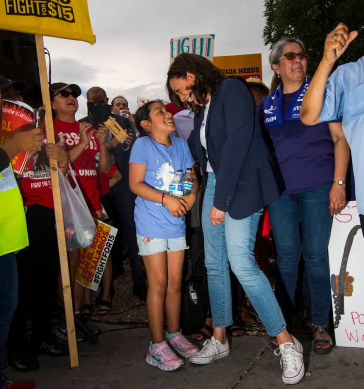 U.S. Sen. Kamala Harris, D-Calif., a Democratic presidential hopeful, talks with Allison Valenz ...