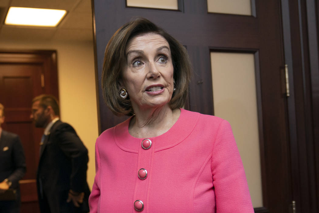 Speaker of the House Nancy Pelosi, D-Calif., arrives for a closed-door meeting with her Democra ...