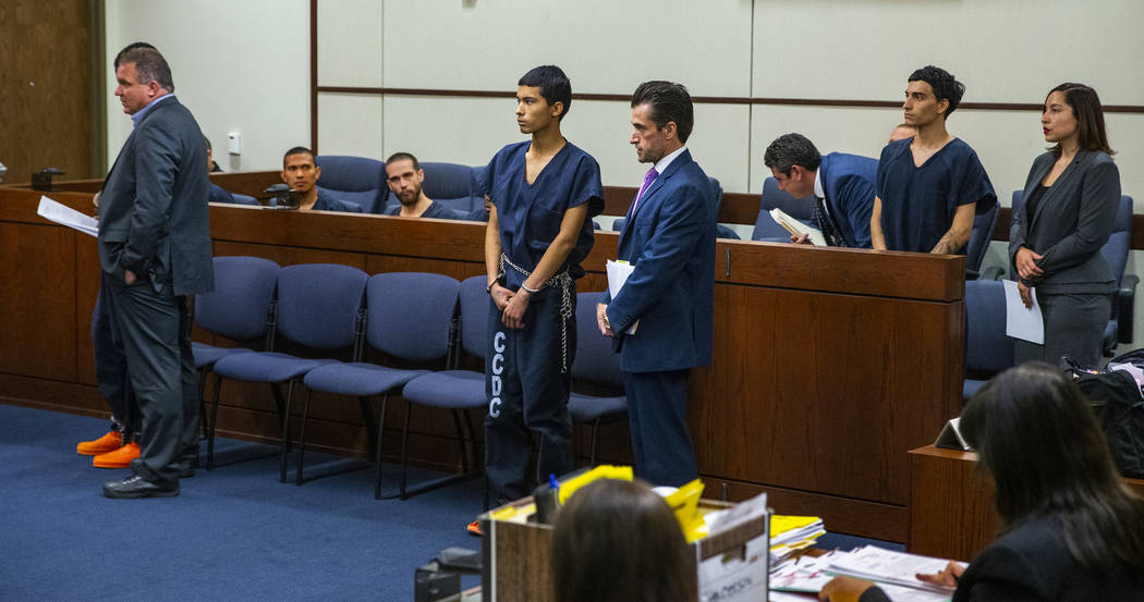 Defendants Tahj Simeus, Josue Turcios and Joseph DeFrancisco stand before the judge with their ...