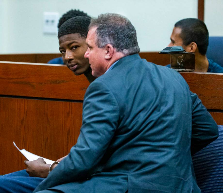 Defendant Tahj Simeus sits in court with his lawyer Keith Brower while appearing before the jud ...