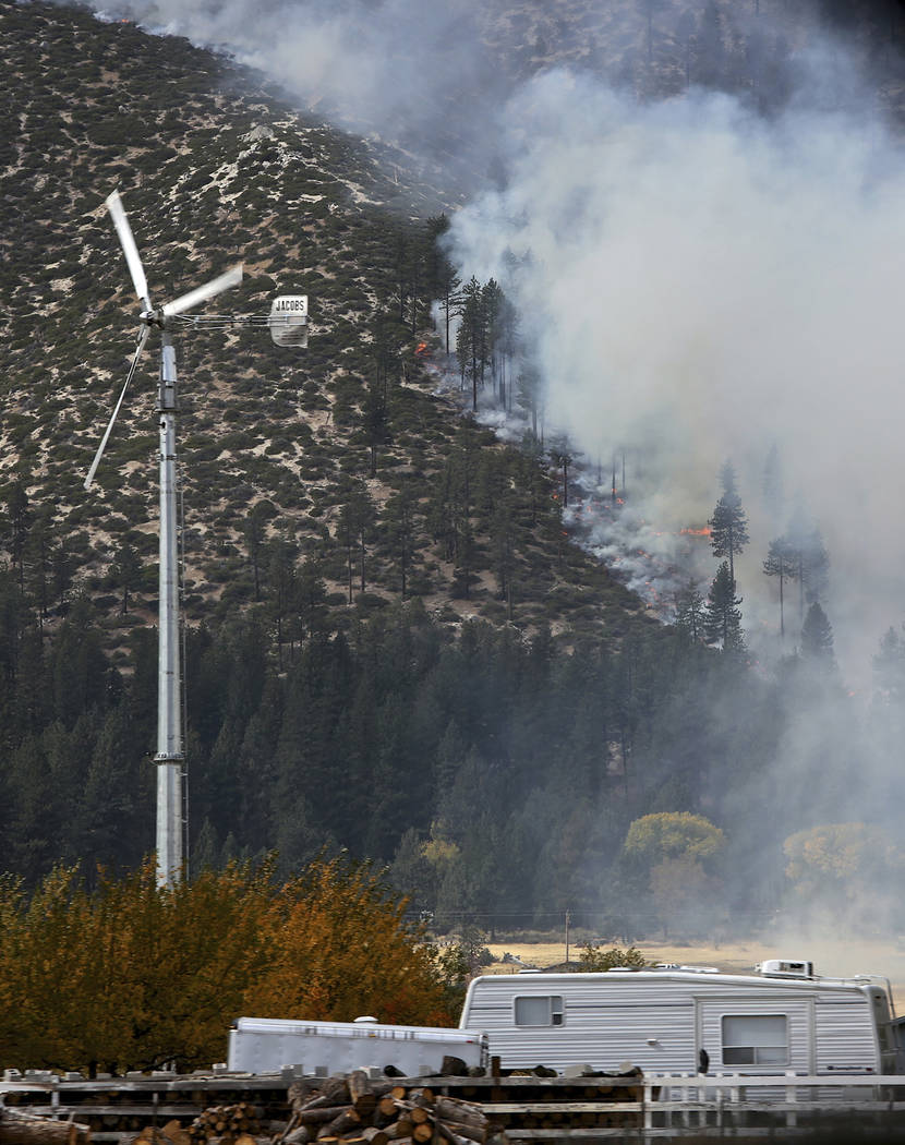 The hills above Franktown Road burn in Washoe Valley, Oct. 14, 2016. The state of Nevada has re ...