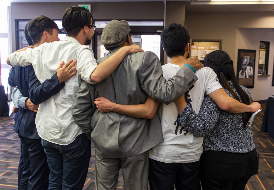 Friends with the Collegiate Association for the Research of Principles gather for a photo durin ...