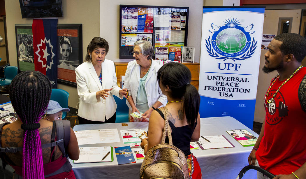 Regional Executive Director Maria Vargas, left, talks beside local Executive Director Leslie Ri ...