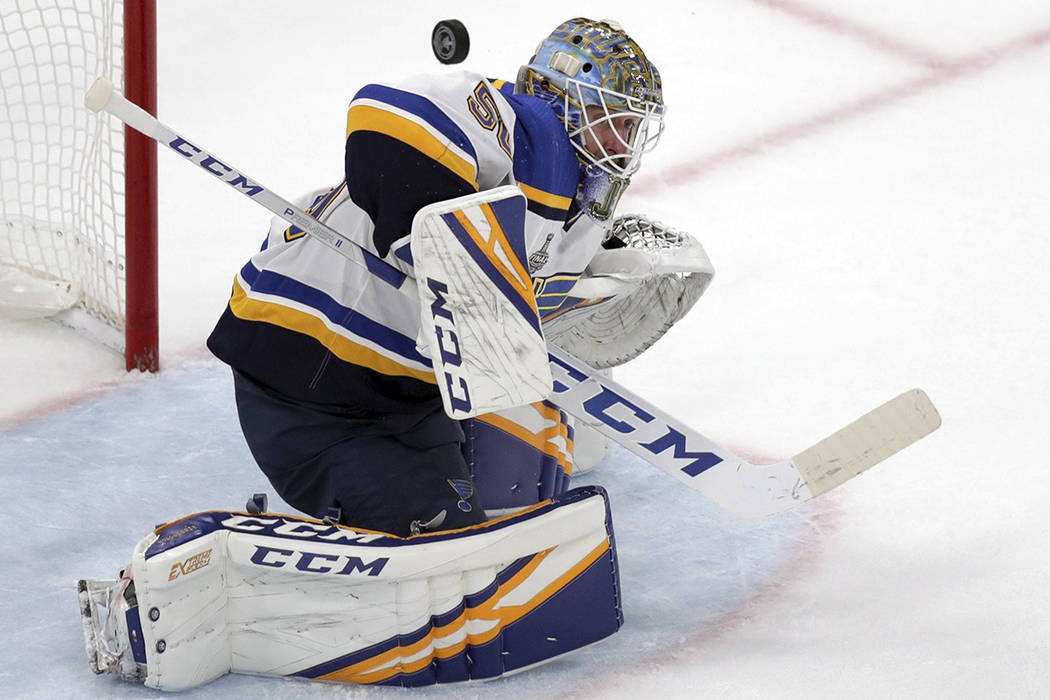 St. Louis Blues goaltender Jordan Binnington turns a shot away during the second period in Game ...