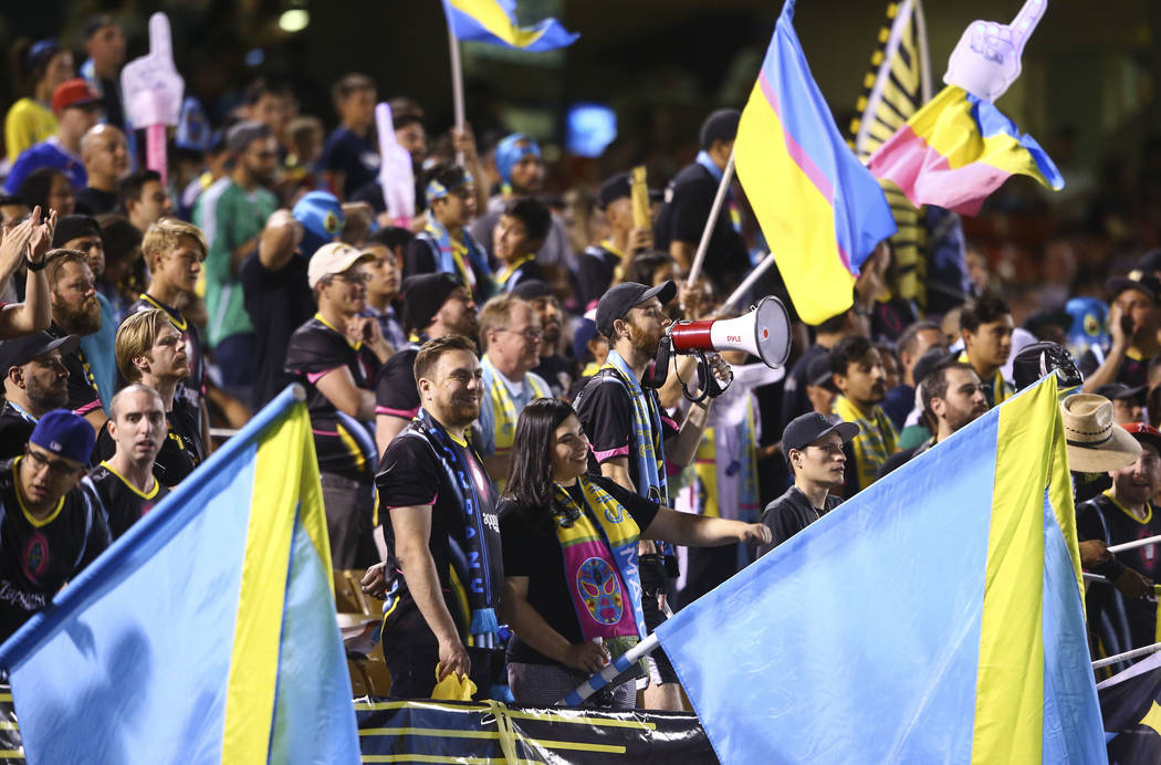 Las Vegas Lights FC fans cheer during a United Soccer League game at Cashman Field in Las Vegas ...