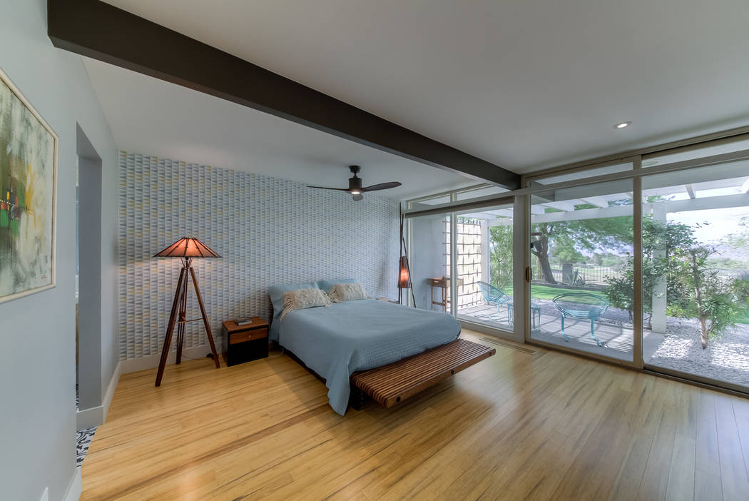 The master bedroom opens to a patio. (Realty One Group)