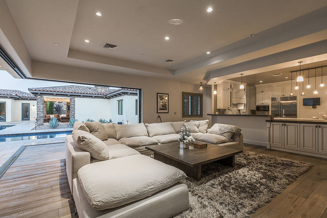 The great room opens to the pool. (Ivan Sher Group)