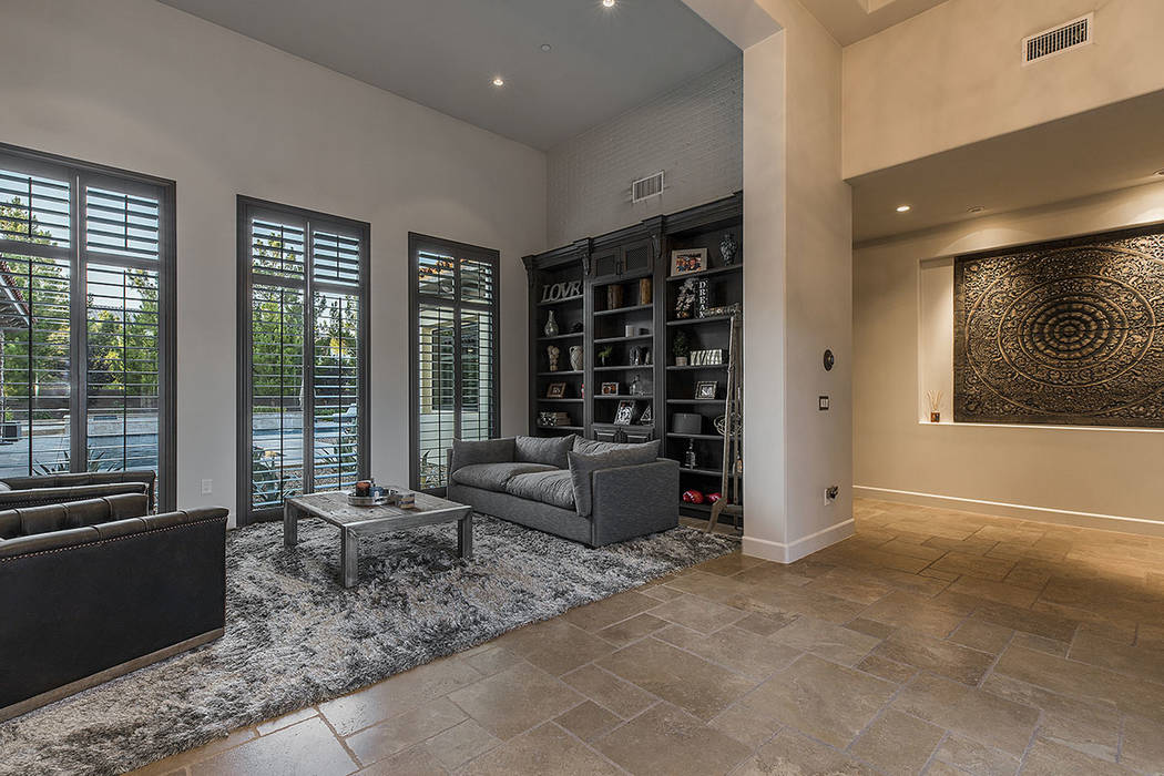 The living room faces the pool. (Ivan Sher Group)