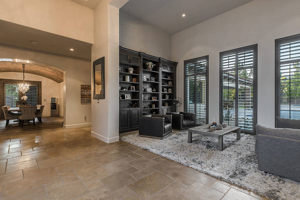 The living room is off the dining room. (Ivan Sher Group)