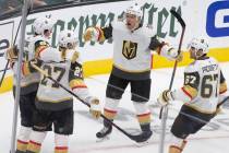 Golden Knights center Paul Stastny (26) celebrates with teammates Max Pacioretty (67) and Shea ...