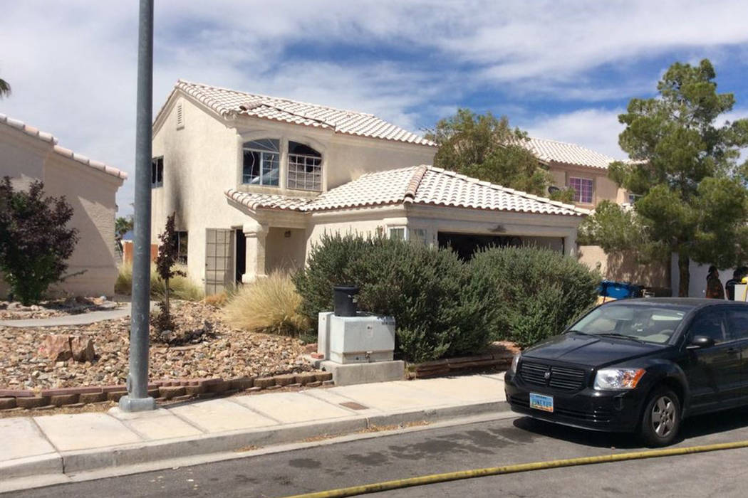 Crews investigate a fire Thursday, June 13, 2019, on the 8300 block of Carmen Boulevard in Las ...