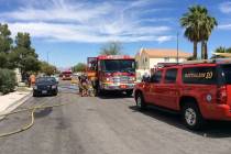 Crews investigate a fire Thursday, June 13, 2019, on the 8300 block of Carmen Boulevard in Las ...