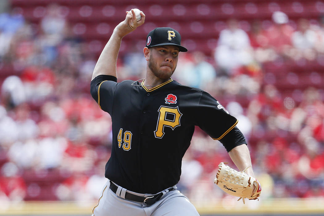 CORRECTS CITY TO CINCINNATI NOT COLUMBUS - Pittsburgh Pirates starting pitcher Nick Kingham thr ...