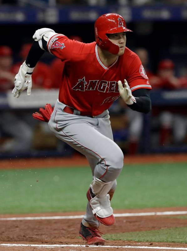 Los Angeles Angels' Shohei Ohtani, of Japan, runs to first with a triple off Tampa Bay Rays' Ry ...