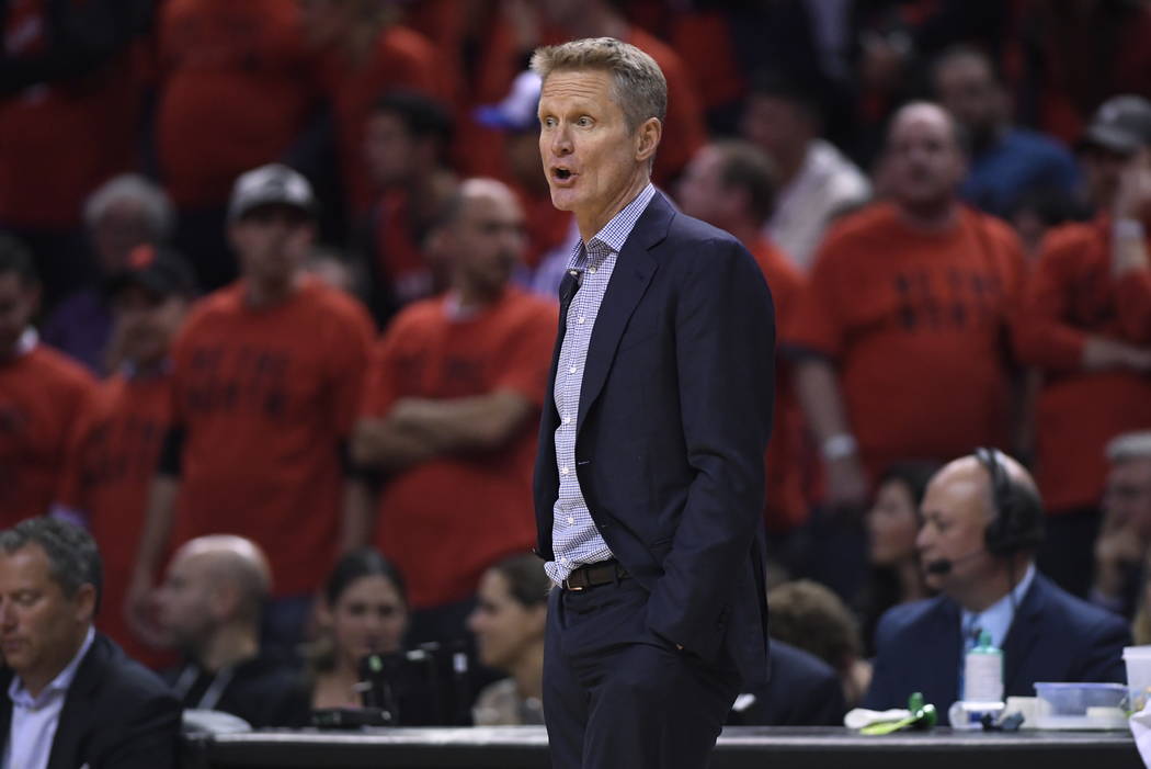 Golden State Warriors coach Steve Kerr watches the action against the Toronto Raptors during se ...